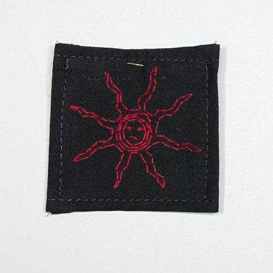 Face within the sun Hand Embroidered Patch